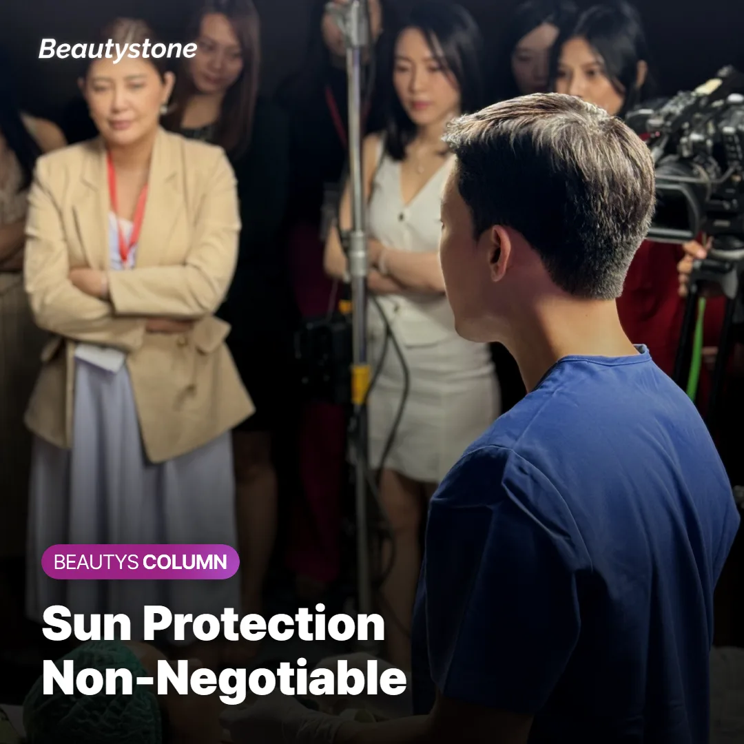 Person applying sunscreen outdoors to protect RF microneedling results