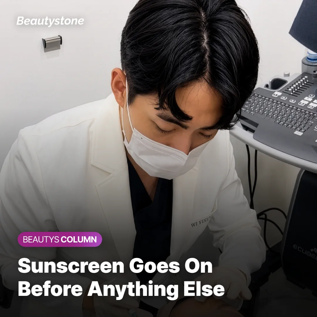 A woman applying sunscreen to her face with her fingertips before makeup