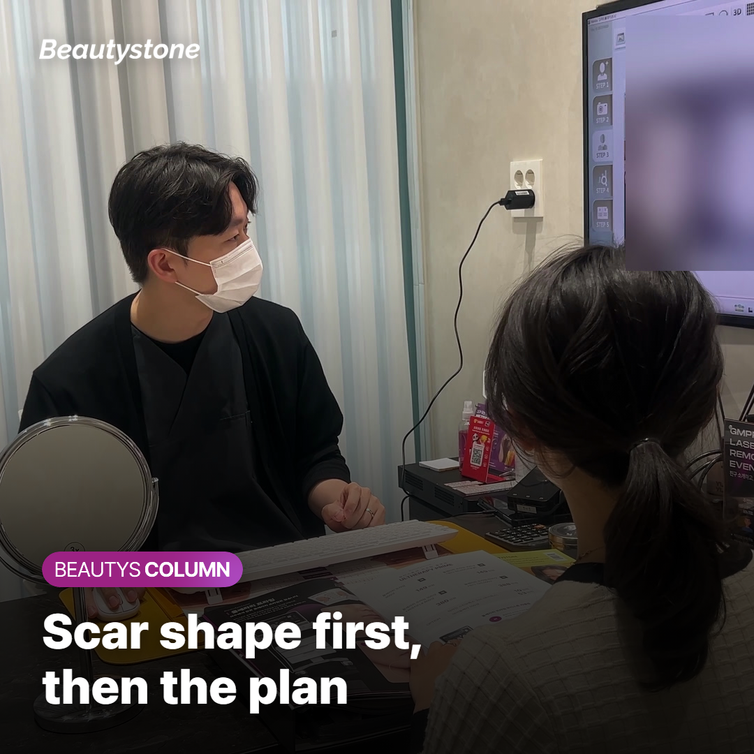 Doctor examining the shape and depth of acne scars before planning laser sessions