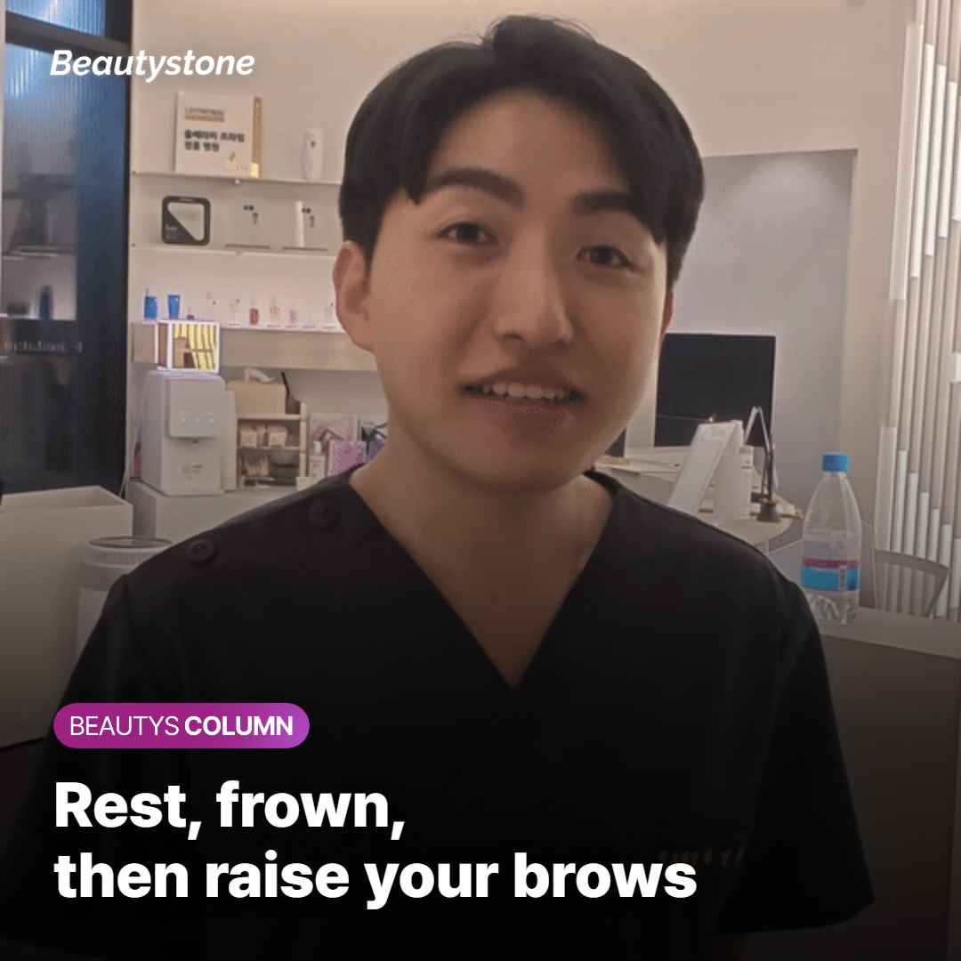Doctor observing a patient frowning and raising her eyebrows during a botox consultation