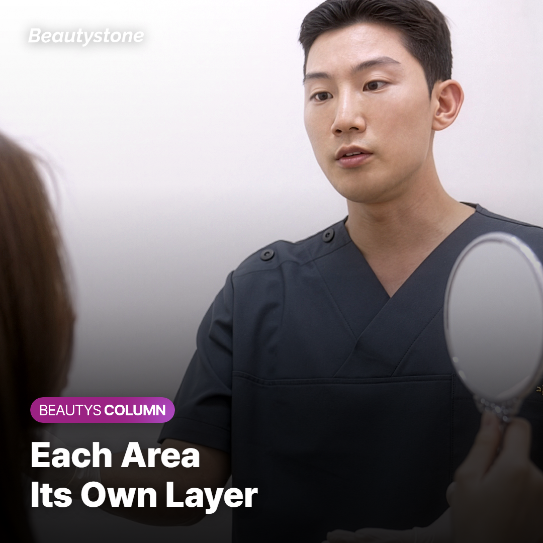 A doctor examining hollowing below a patient's cheekbone and around the smile lines